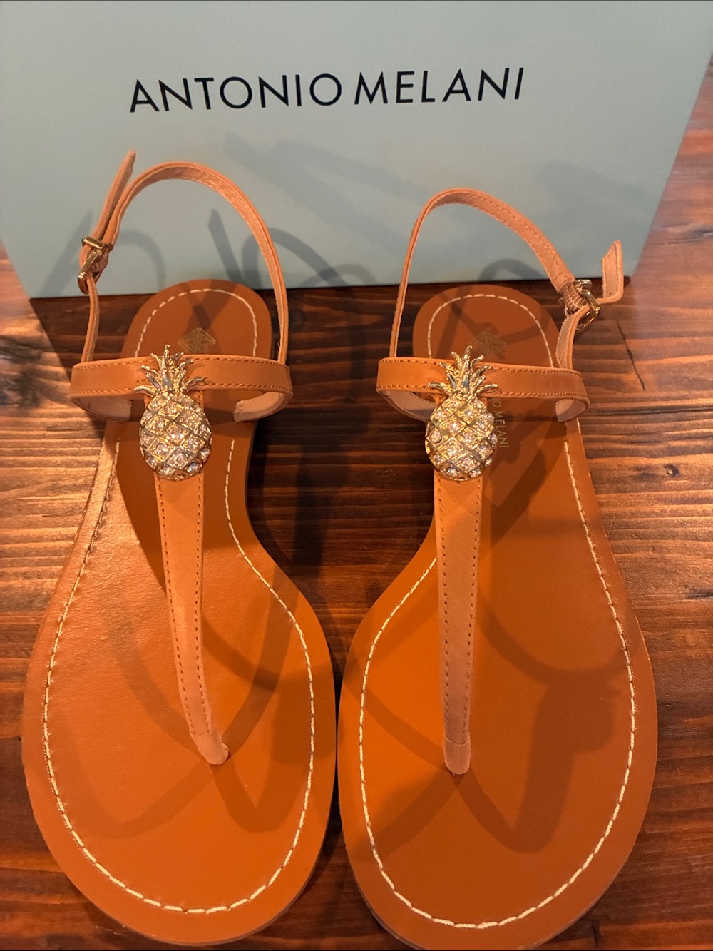 ANTONIO MELANI Tan Leather T-Strap Sandals with Gold Pineapple Charms